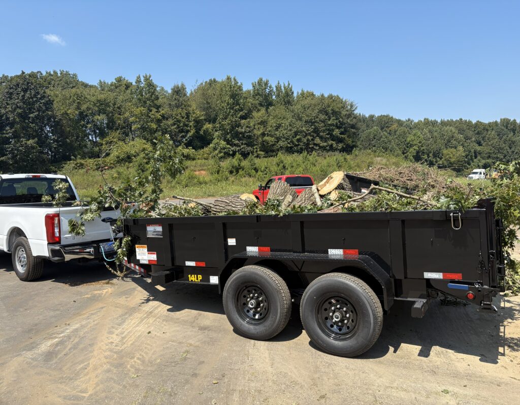 MTM Tree Services tree removal trailer in Charlotte NC residential tree services
